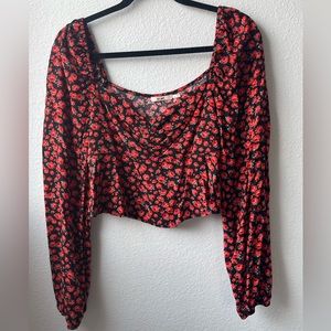 Red floral blouse